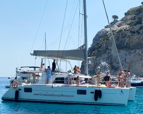 Esplora le Spiagge Della Costa Orientale, Navigando con Il Catamarano Wind | Cruises | Captains Tours Rhodes Greece